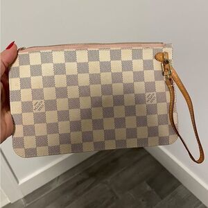 Louis Vuitton 
Pochette Wristlet